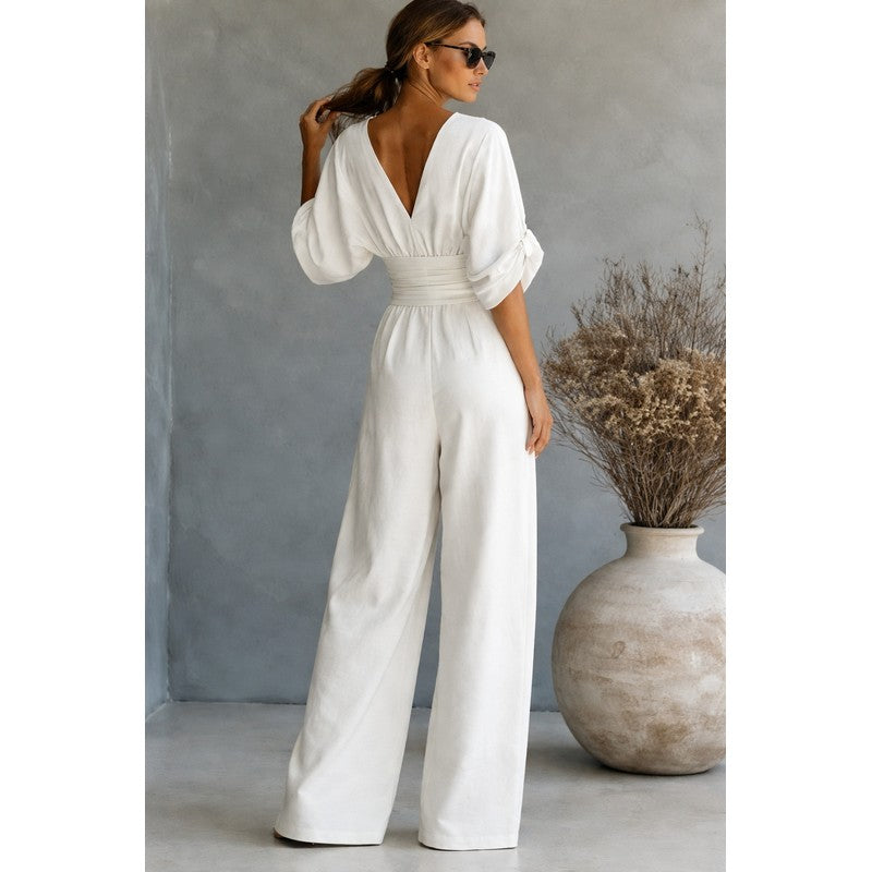 Dame jumpsuit med vid ben og V-udskæring