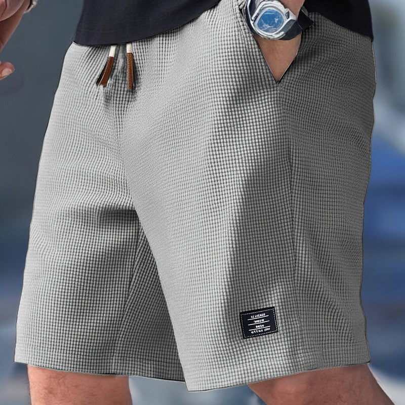 Herreshorts med elastisk talje og sidelommer
