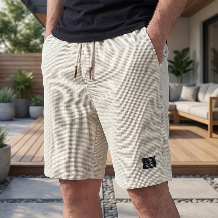 Herreshorts med elastisk talje og sidelommer