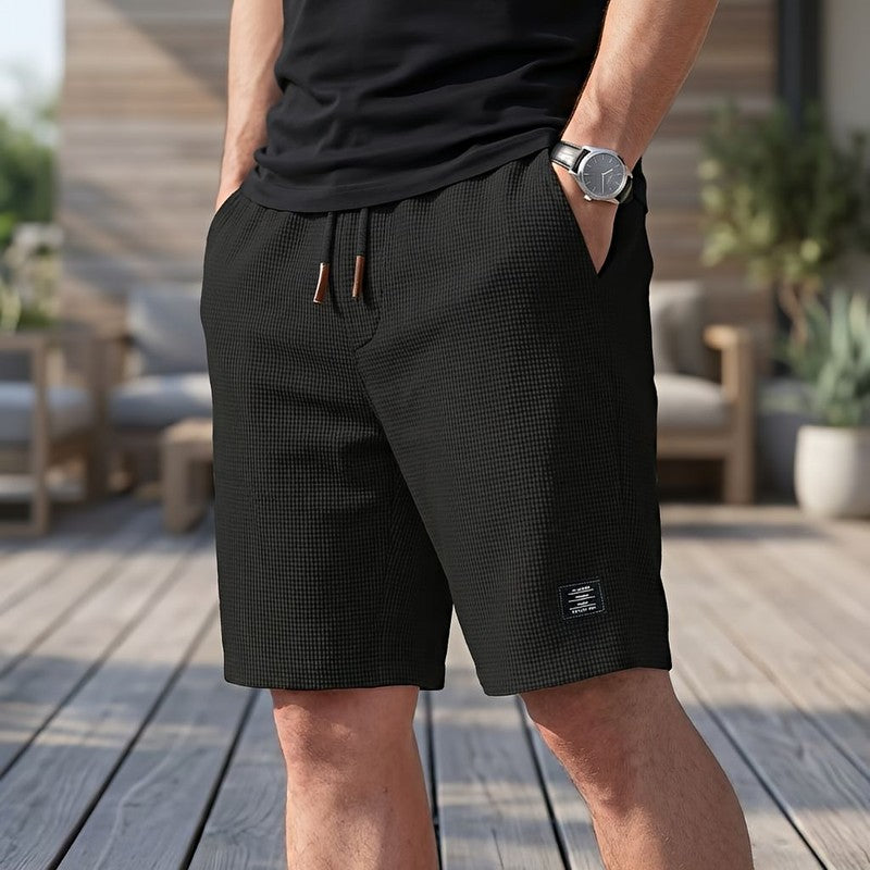 Herreshorts med elastisk talje og sidelommer