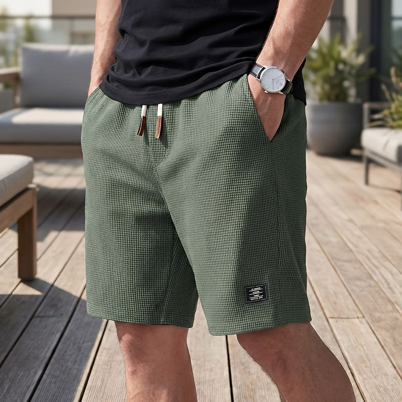 Herreshorts med elastisk talje og sidelommer