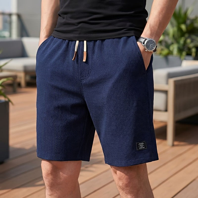 Herreshorts med elastisk talje og sidelommer
